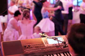 Dancing couples during party event or wedding celebration