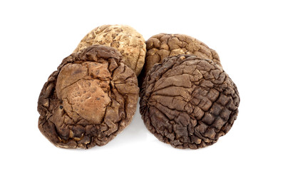 dried shiitake mushrooms, chinese mushrooms on white background.
