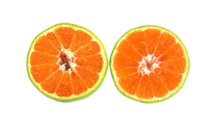 green tangerine on white background.