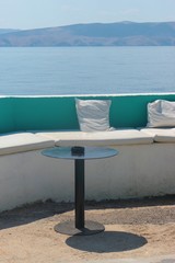 Sea bar with comfortable sofa and the adriatic sea. Senj, Croatia, South Europe.