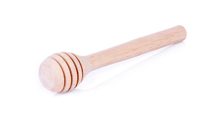 wooden honey scoop, spoon, dipper on white background