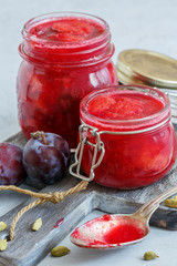 Fototapeta na wymiar Homemade plum jam in glass jars.