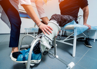 Patient on CPM (continuous passive range of motion) machines. Device to provide anatomically correct motion to both the ankle and subtalar joints.