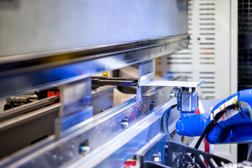 Hand robot working automatic cutting and bending metal sheet by high precision metal sheet bending machine, cnc control metal sheet bending machine in factory