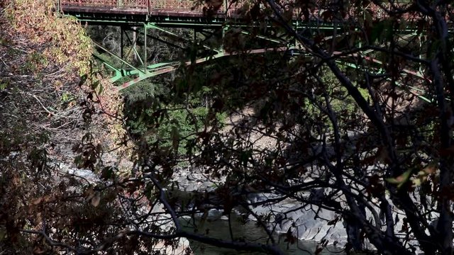 Beautiful yuba river flowing with a bridge above the water