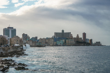 Fototapeta premium La Habana, Cuba - 10 January, 2017: side view of huge city with buildings near the port
