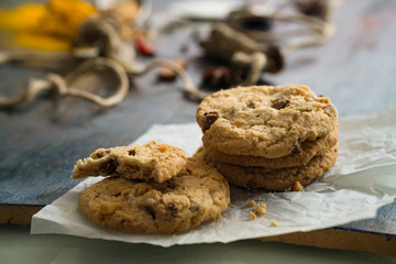 Biten biscuit cookie with almond on the table