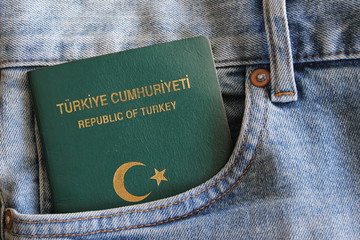 A turkish green passport in a pocket