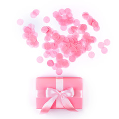 Present box with pink bow on white background.