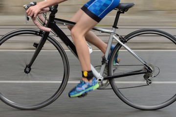Fototapeta na wymiar blurred image of cyclist, motion effect