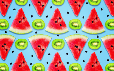 Background of slices of watermelon and kiwi, top view