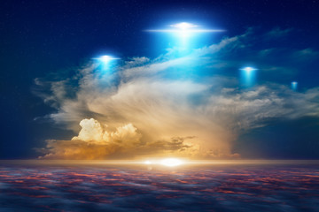 Amazing fantastic background - ufo with blue spotlights in red glowing sky © IgorZh