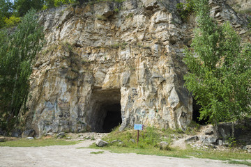 Old abandoned adit in the village of Shiryaevo