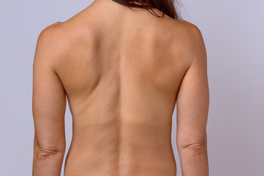 Bare back of a healthy toned fit woman