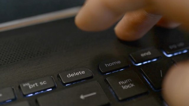 Pressing the delete key on on laptop or computer keyboard