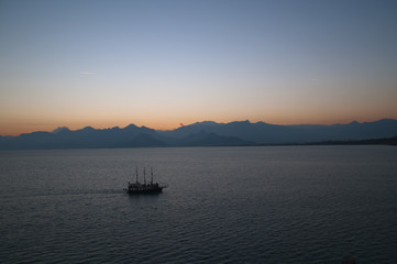 Fototapeta na wymiar Blue cruise tour boats - Antalya - Turkey