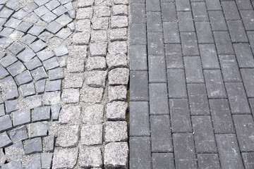 Different kind of pavement cobblestone on the street