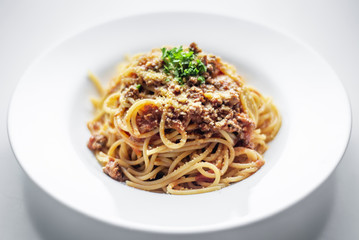 spaghetti pasta bolognaise with beef and tomato parmesan sauce