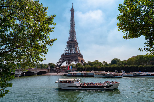 cruise ship in front of the Eiffel Tower