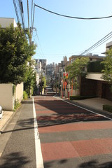 Street of tokyo, japan in the afternoon sun