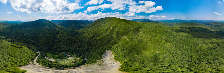 Aerial landscape of the Caucasus Mountains, forests, river. Panoramic photo 360 degrees.