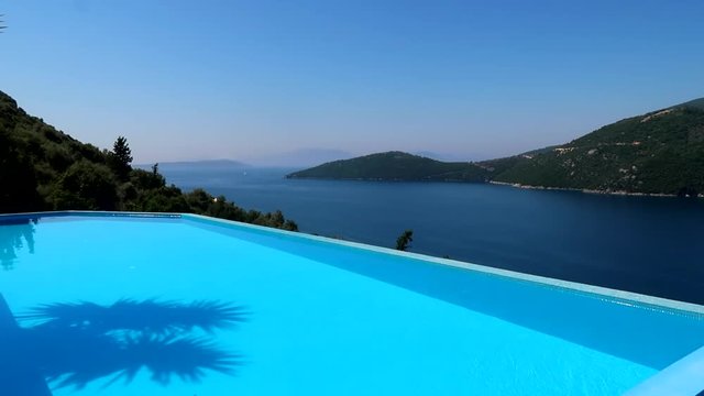 Time lapse holiday pool overlooking the sea