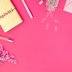 Styled pink feminine workspace flat lay