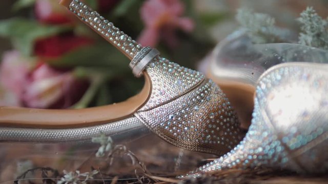 White wedding rings on a beautiful background.