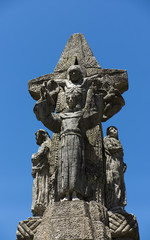 Fototapeta na wymiar Cross of St. Francis standing next to the Franciscan church of Santiago de Compostela