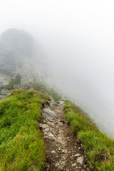 Misty mountains and hiking trail