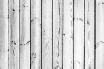 texture of vertical wooden panels, wall of gray boards, abstract background