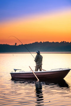 man fishes in the lakes of the Mazury