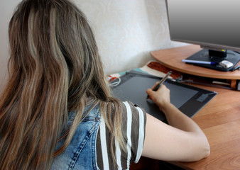 the girl behind the tablet