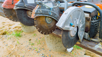 Fototapeta premium This diamond saw blade used on a concrete cutting machine has sharp teeth which makes clean cuts in concrete.