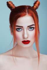 Closeup Fashion Studio Portrait of Beautiful Pretty Woman With Red Hair And Creative Makeup. 