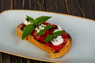 Bruschetta with tomato and cheese