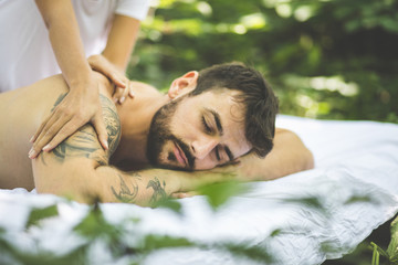 Obraz na płótnie Canvas Young men enjoy in massage.