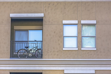 Bicycle seen on balcony of residential building
