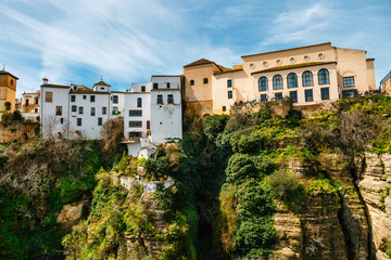 Fototapeta na wymiar El Tajo Gorge Canyon with white spanish houses in Ronda, Spain