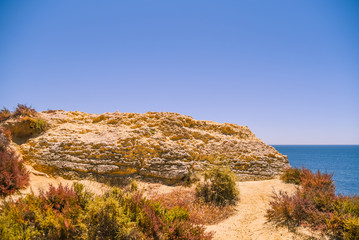Bright blue sky and sea natural Algarve Portugal outdoors background. Sunny day travel vacation destination panoramic images.