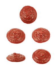 Little puddle of ketchup sauce isolated
