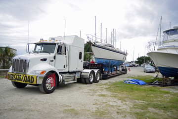 Transporting large sailboat on a flat bed