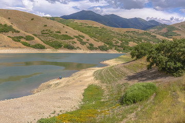 Fototapeta premium Lake view with fishing fishermen