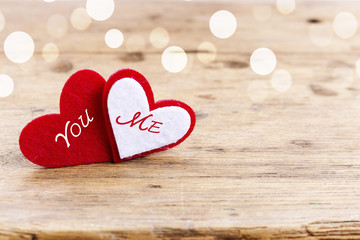 Red Heart of Truly love concept on rustic wooden table with light bokeh and copy space. Valentine day, wedding celebration. You and Me love forever concept. 