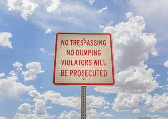 No Trespassing no dumping sign