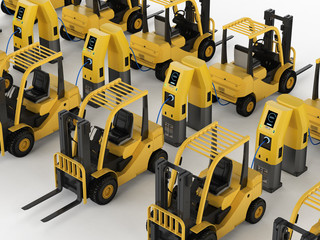 forklift trucks charge at station © phonlamaiphoto