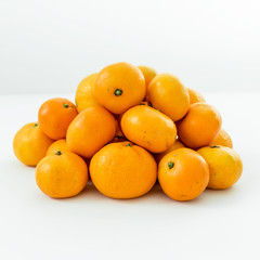 Fresh citrus fruits isolated on white background. Flat lay. Top view