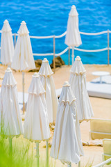 Sketches with beach umbrellas at Cape Martin. Cote d'Azur. France