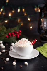 Fototapeta na wymiar Peppermint Latte on a Table set for the Holidays