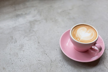Cappuccino on a concrete surface